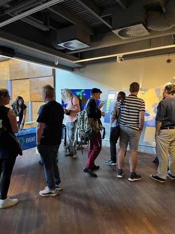 DDDEU attendees looking at Event Store booth